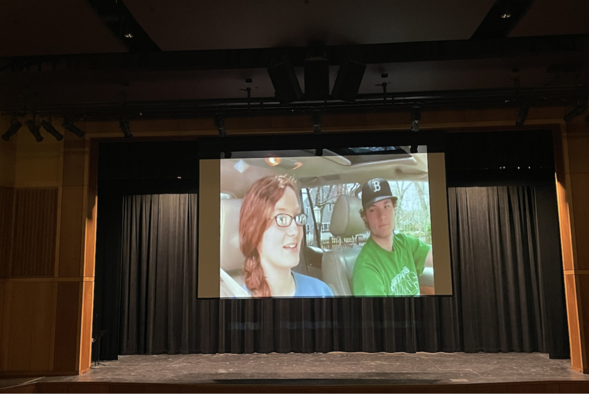  An image captured from the short film “Envision” screening in the WHS theater. This movie features a shy girl learning that she can change the way she presents herself in time.